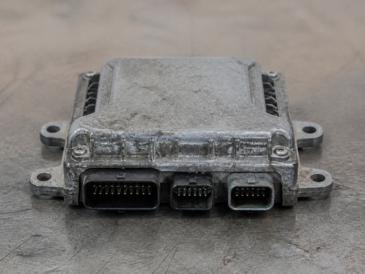Representative photo of a used Drivetrain Control Module; exact item, fitment, condition, and availability confirmed by quote